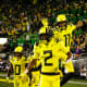 Oregon Ducks wide receiver Dont'e Thornton (2) and Troy Franklin (11) celebrate a touchdown against the Washington Huskies.